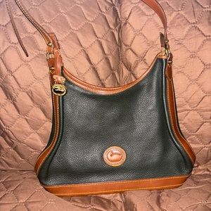 Never used Dooney and Bourke leather handbag